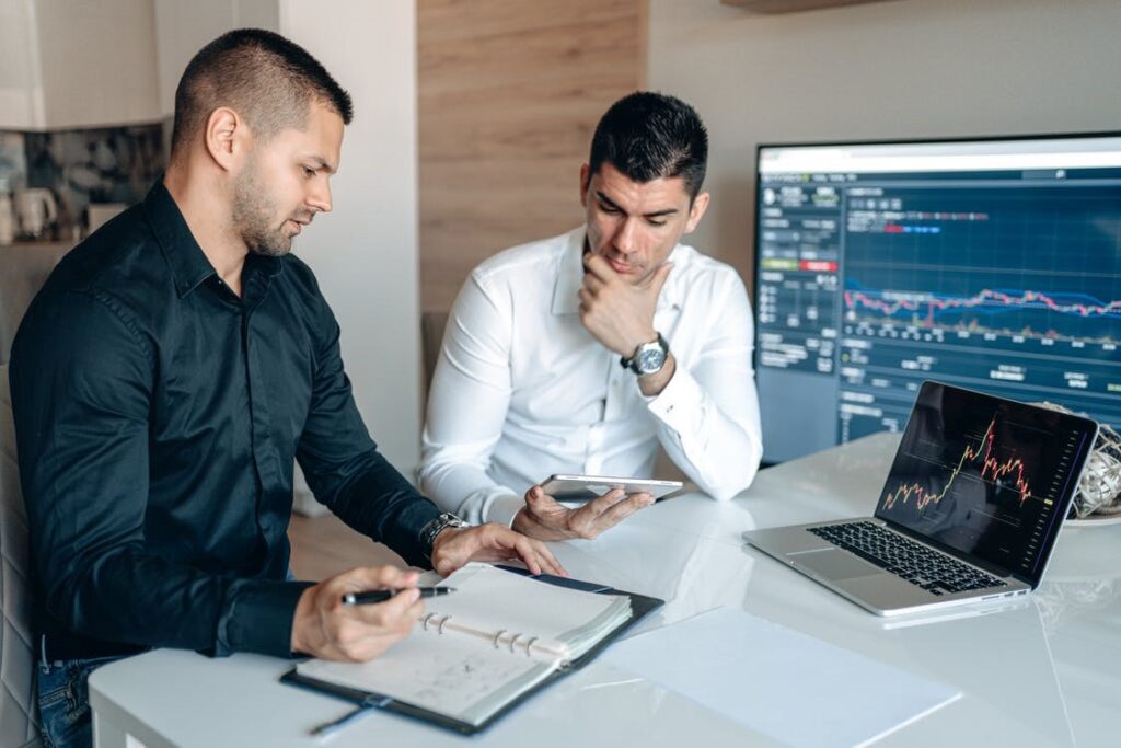 Men discussing a strategy in a meeting at the office