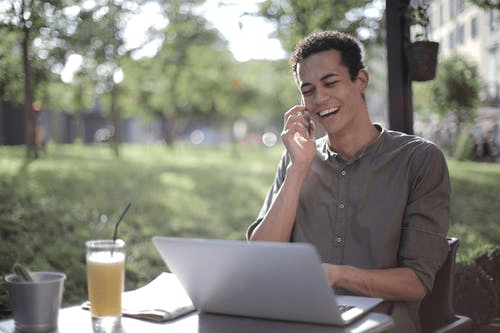 An entrepreneur working with cloud-based computing in the park